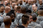 MEETING THE TROOPS - Click for high resolution Photo