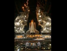 Space shuttle Endeavour leaves the Vehicle Assembly Building.