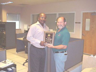 Steve Griffin receiving the Natonal Weather Service 2001 Southern Region Director's Award for Teamwork.