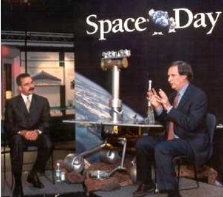 Robert Krulwich, Cyber Space Day webcast host, interviews Orlando Figueroa, of NASA's Mars Exploration program.