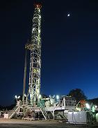 Drilling rig at night, San Andreas Fault Observatory at Depth (SAFOD). USGS photo.