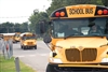 Members of the Louisiana National Guard drive school buses to different evacuation sites throughout the state to assist with hurricane operations, Aug. 31, 2008. 