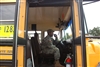 A member of the Louisiana National Guard prepares to drive a school bus to an evacuation site in New Orleans to assist with hurricane operations, Aug. 31, 2008. 