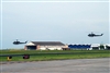 Two National Guard UH-1 medical helicopters prepare to land at the New Orleans Lakefront airport as they assist with hurricane evacuation operations, Aug. 31, 2008. 