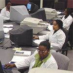 Photograph of technicians in the Document Conversion Lab