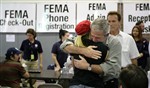 BUSH CONSOLES WILDFIRE VICTIMS - Click for high resolution Photo