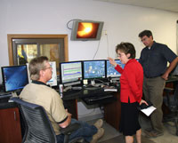 Pictured with Secretary Gassman are CLM employee Jay Faugerstrom and Plant Manager Phil Marquis.