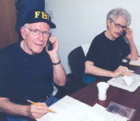 Photograph of two volunteers at the Financial Crimes Victim Call Center