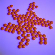 Photograph of pills arranged in a pinwheel shape