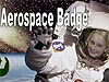 The words Aerospace Badge above a young girl in a white astronaut suit