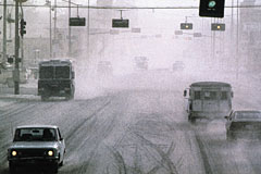 photograph showing cars driving through ash in Yakima, Washington, in May of 1980