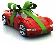 red sports car wrapped in a green bow