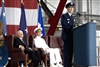 Defense Secretary Robert M. Gates and U.S. Navy Adm. Mike Mullen, chairman of the Joint Chiefs of Staff, listen as U.S. Air Force Gen. Duncan J. McNabb addresses the audience at his assumption ceremony as commander, U.S. Transportation Command, Scott Air Force Base, Ill., Sept. 5, 2008. 