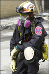 Photo of a rescue worker wearing mask.