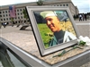 A photo of Navy Electronics Technician First Class Brian A. Moss, who died along with 183 others during the Sept. 11, 2001, terrorist attack at the Pentagon, sits on the inscribed memorial unit dedicated to Moss' honor. The memorial park was dedicated on Sept. 11, 2008. 