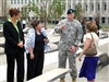 Visitors to the Pentagon Memorial gather around one of the park's 184 inscribed memorial units, which honor the Sept. 11, 2001, terrorist attack victims that died at military headquarters. The park was dedicated on Sept. 11, 2008. 