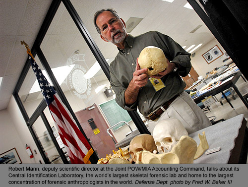 Robert Mann, deputy scientific director at the Joint POW/MIA Accounting Command, talks about its Central Identification Laboratory, the world's largest skeletal forensic lab and home to the largest concentration of forensic anthropologists in the world. Defense Dept. photo by Fred W. Baker III