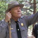 Ranger Bob Fry speaking to visitors during a ranger walk