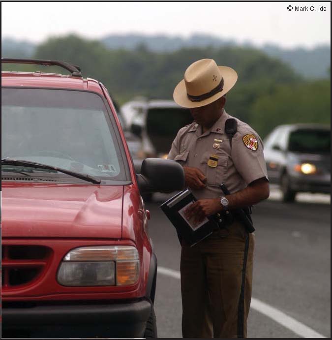 Photograph officer conducting a traffic stop