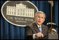 President George W. Bush emphasizes a point as he responds to a question Monday, Aug. 21, 2006, during a news conference at the White House Conference Center Briefing Room. He told the gathered media "America is making a long-term commitment to help the people of Lebanon because we believe every person deserves to live in a free, open society that respects the rights of all."  White House photo by Paul Morse