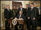 President George W. Bush signs H.R. 6061, the Secure Fence Act of 2006, in the Roosevelt Room Thursday, Oct. 26, 2006. Pictured with the President are, from left: Commissioner Ralph Basham of U.S. Customs and Border Protection; Chief David Aguilar of U.S. Customs and Border Protection; Congressman Peter King, R-N.Y.; Congressman John Boehner, R-Ohio; and Deputy Secretary Michael Jackson of the Department of Homeland Security; and Senator Bill Frist, R-Tenn. White House photo by Kimberlee Hewitt