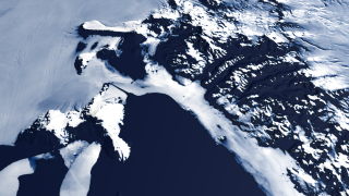 Lower resolution MOA data (150 meters per pixel) of the same area surrounding McMurdo Station.
