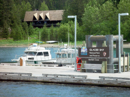 Glacier Bay Lodge and Visitor Center in background, with the Bartlett Cove Public Dock in the foreground.