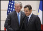 President George W. Bush and President Nicolas Sarkozy of France, shake hands following their joint press availability Saturday, June 14, 2008, in Paris.  White House photo by Eric Draper