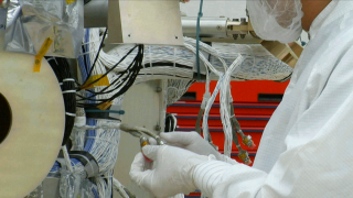 This footage shows cleanroom footage of the GLAST satellite in 2006.