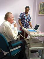 Image of a man taking spirometry test