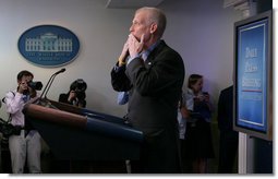 White House spokesman Tony Snow blows a kiss to the press corps Wednesday, Sept. 12, 2007, after delivering his final briefing in the James S. Brady Briefing Room. Said Mr. Snow, "This job has been the most fun I have ever had, the most satisfying, fulfilling job." White House photo by Chris Greenberg