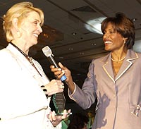 Carol Quinn (left) accepts the Diversity and Multicultural Award for Argonne