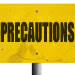 a yellow precaution sign