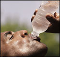 photo of man drinking water