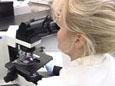 Woman Using Microscope