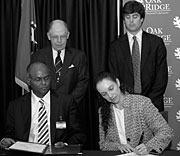 Signing the SuperPower agreement are (from left) SuperPower's “Selva” Selvamanickam, ORNL Partnerships Director Tom Ballard, DOE Principal Deputy Assistant Secretary for Electricity Delivery and Energy Reliability Patricia A. Hoffman and ORNL Director Thom Mason.