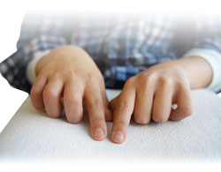 Person reading braille