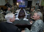 DISCUSSING DEFENSE - Click for high resolution Photo