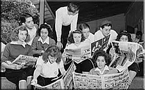 People happily reading newspapers.