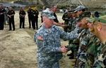 GUARD CHIEF VISITS TROOPS - Click for high resolution Photo