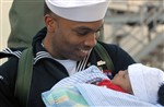 PROUD FATHER - Click for high resolution Photo