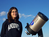 Abigail, an Earth Explorer, loves to use her telescope to explore the night sky.