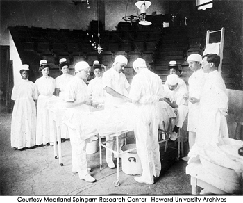 African American surgeons operate on a patient at Freedmen's Hospital amphitheater, 1903. Courtesy Moorland Spingarn Research Center - Howard University Archives