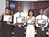 Students from Drew Freeman Middle School holding certificates they received from the Minority University-Space Interdisciplinary Network