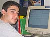 Adam Greenbaum sitting at a computer