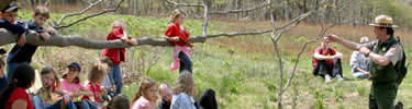 A park ranger helps a group of 2nd graders learn about Shenandoah.