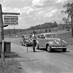 Historic photo of the first car to pay a fee to enter Shenandoah National Park at the North Entrance Station.