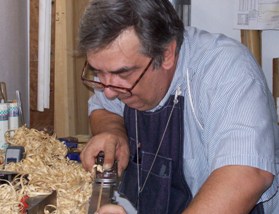 image of Ren M. making a fly rod