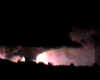 Lightning at night illuminates a suspicious-looking cloud over southern Illinois