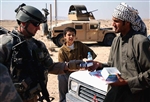 DISTRIBUTING SUPPLIES - Click for high resolution Photo